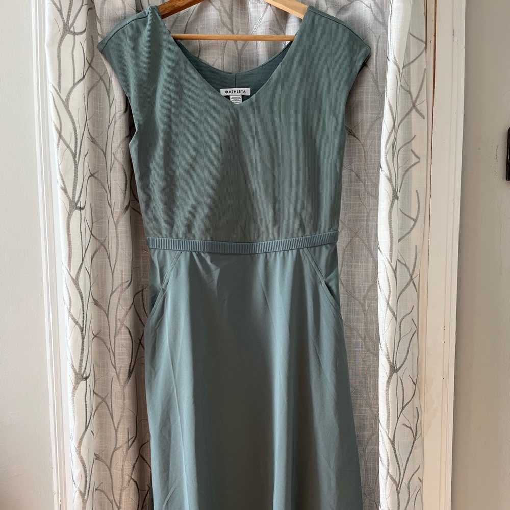 Athleta Ryder dress. Cutout in back, and pockets.
